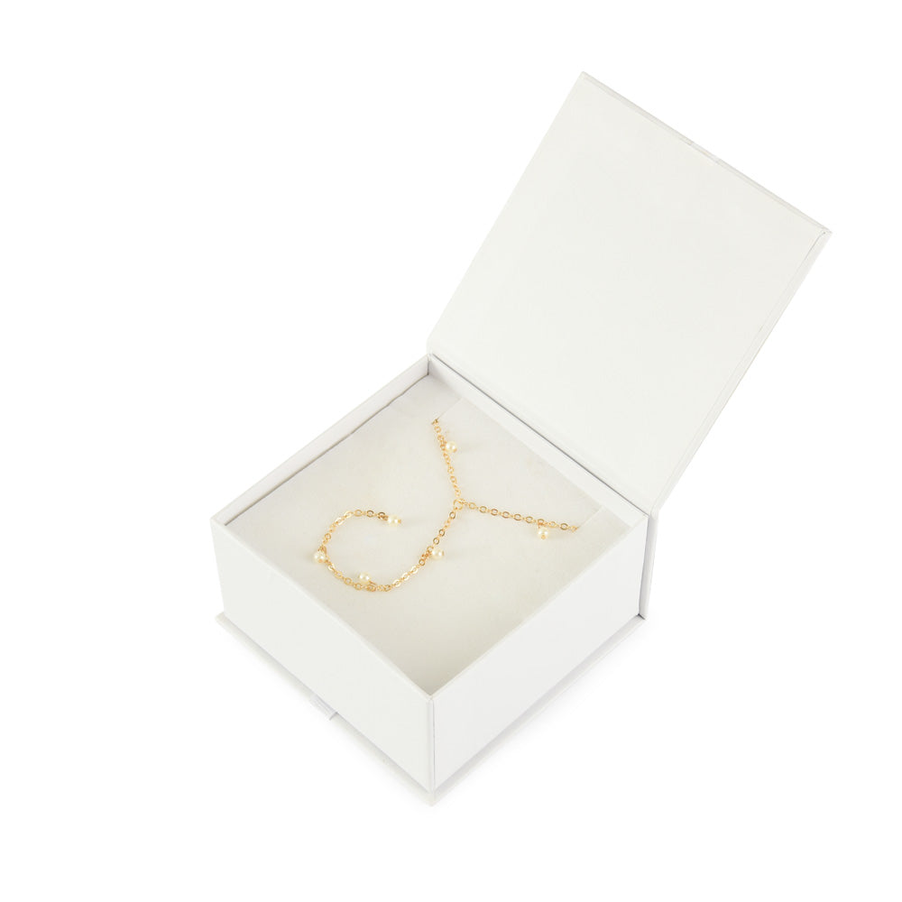 Collar con colgante perlina dorado