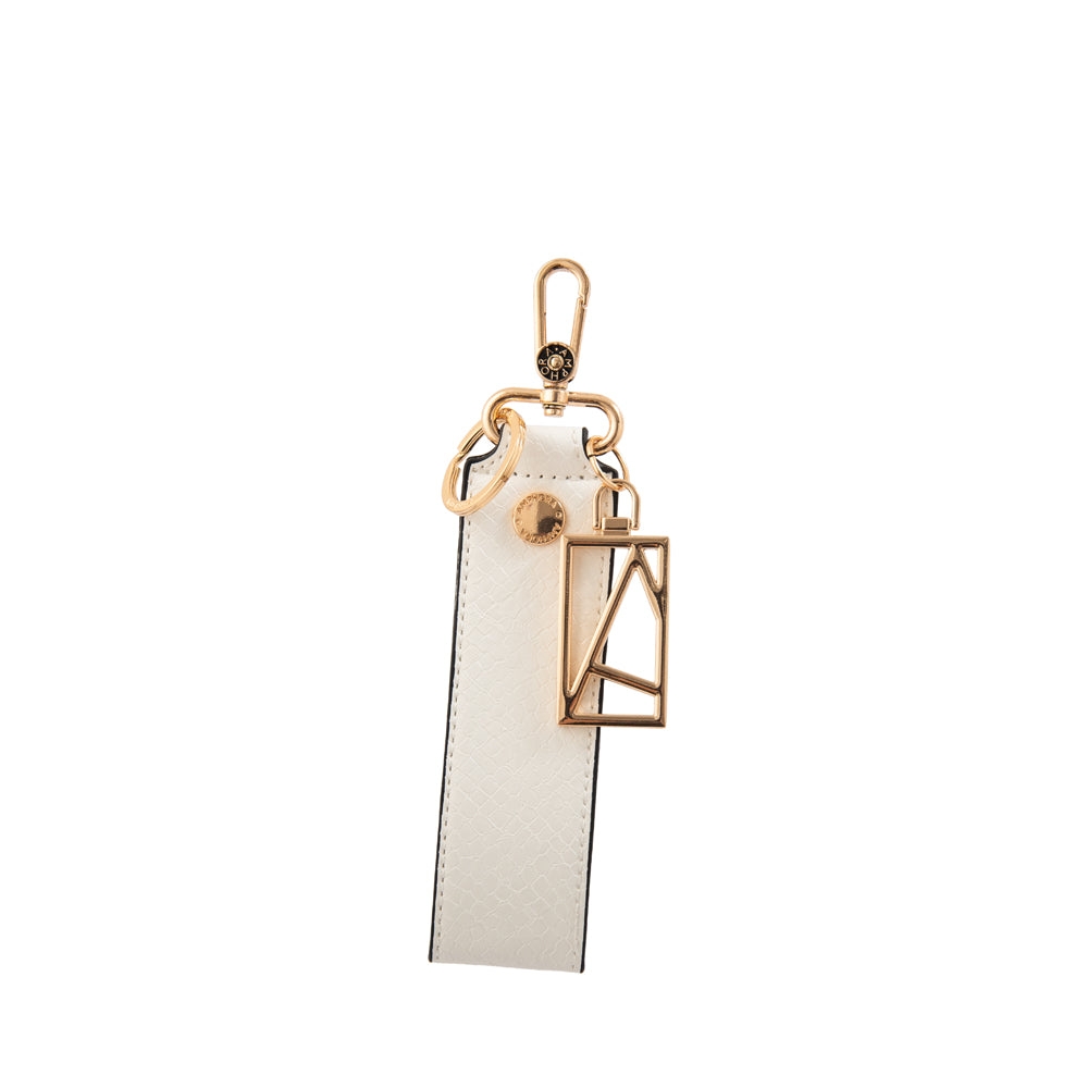 Hanging muñequera con colgante eskai blanco
